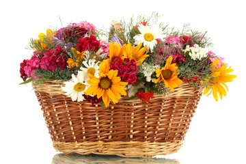 beautiful bouquet of bright  wildflowers in basket, isolated