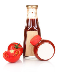 Tomato sauce in bottles isolated on white
