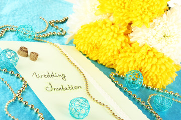 wedding invitations on decorated table close-up