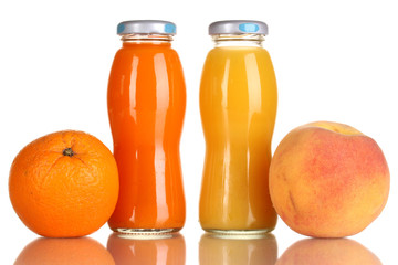 Delicious orange and peach juice in bottle and orange and peach