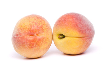tasty peaches on white