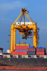 Containers loading at sea trading port