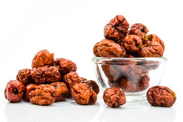 Dried Chinese Jujubes Fruits on white background.