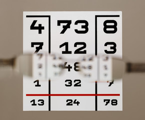 Eye test chart with eyeglasses