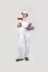 Female decorator about to start painting