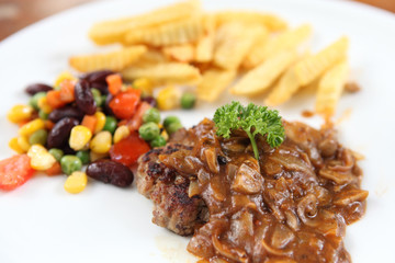 Grilled Porkchop on wood background