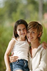 Mother and daughter in the park