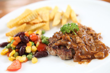 Grilled Porkchop on wood background
