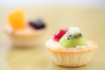 Fruit tart on wood background