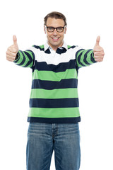 Naklejka premium Cool guy showing double thumbs up to camera