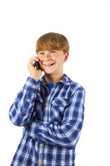 cute handsome young boy speaking a mobile phone