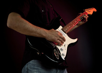 Man playing electrical guitar