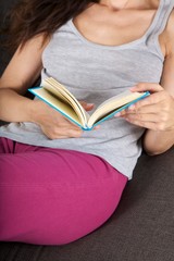 reading lying on sofa