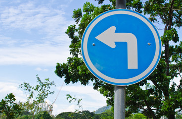 Traffic sign turn left in the park