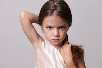 Closeup portrait of angry little girl