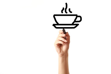 Female hand drawing a cup of hot drink on screen