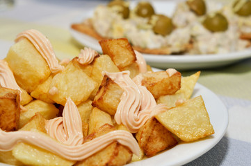 typical spanish patatas bravas, spicy potatoes