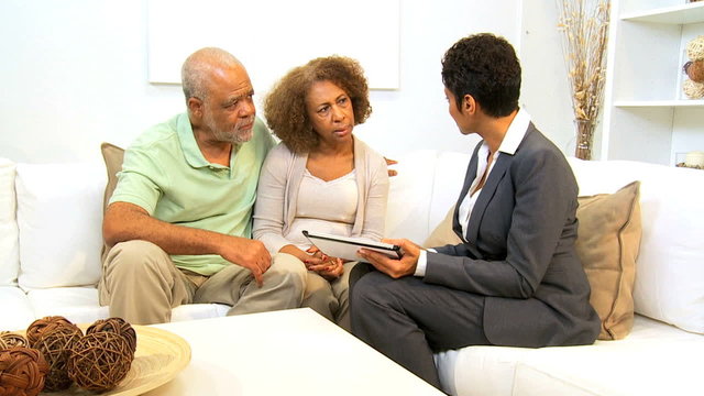 Financial Expert Home Meeting Retired Couple
