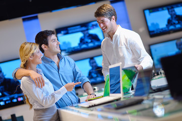 Obraz premium people buy in consumer electronics store