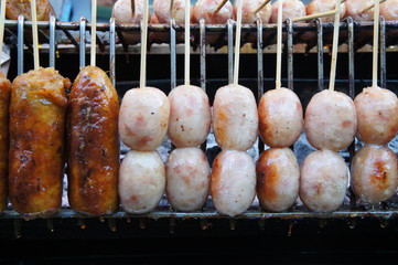Thai Style Grilled Hot Dog on Street Market in Thailand