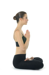 Young woman doing yoga exercise