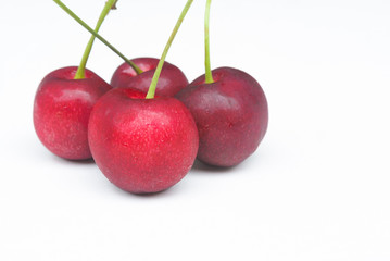 fresh red cherry close up isolate on white background
