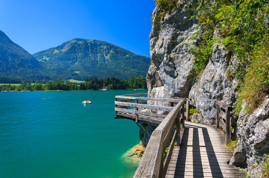 Wooden walkway along beautiful Wolfgang lake, Austria