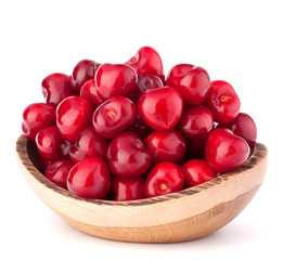 cherry berries in wooden bowl