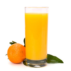 Tangerines and juice glass
