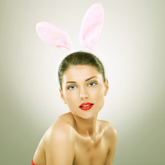 beautiful young woman wearing bunny ears