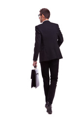walking business man holding a briefcase