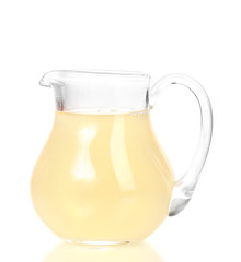 Tropical juice in glass pitcher isolated on white