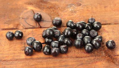 fresh blueberry on wooden background close-up