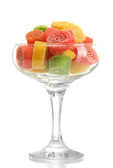 colorful jelly candies in  in cocktail glass isolated on white.