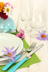 beautiful holiday table setting with flowers