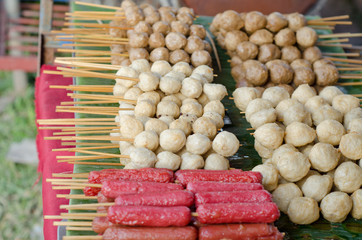 meatballs and hotdog fried , thai street  food