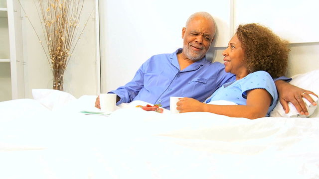 Senior African American Couple Breakfast Bedroom