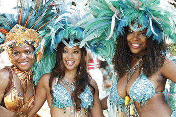 Beautiful women in sparkling Caribana parade costume - obrazy, fototapety, plakaty