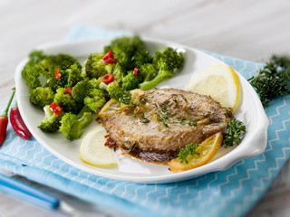 mackerel with steamed broccoli, selective focus