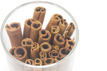 Cinnamon in the Glass Isolated on White Background