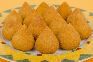 Coxinha: Brazilian deep fried snack filled with shredded chicken