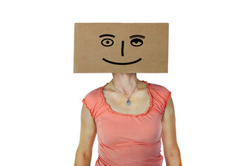 Woman has box with painted face on the head