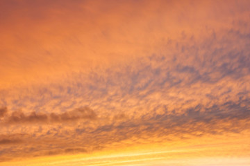 Dramatic sunset with golden clouds