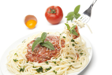 Pasta with tomato sauce basil and grated parmesan