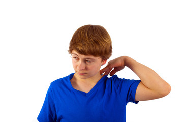 smart happy young boy posing in studio