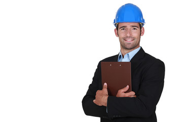 Handsome architect with a clipboard