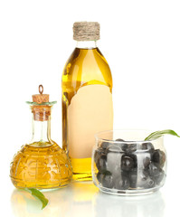 Olive oil bottle and small decanter isolated on white