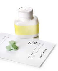 Pharmacist prescription with pills isolated on white