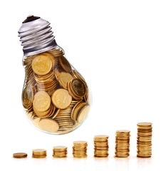 Traditional light glass bulb with many golden coins