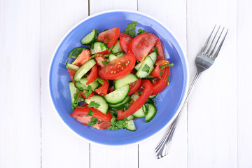 Fresh salad with tomatoes and cucumbers